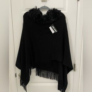 New women’s poncho sweater